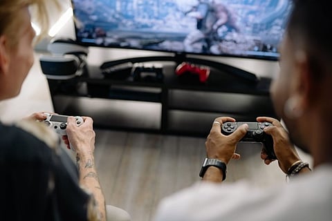 Two people playing video games.