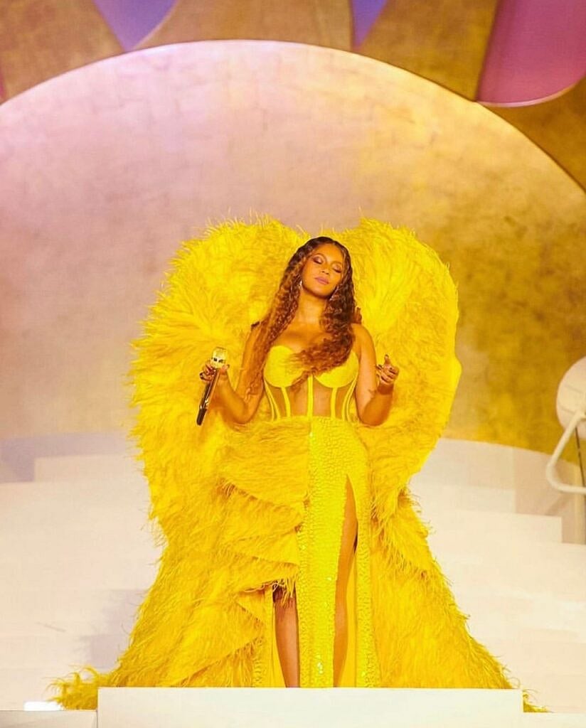beyonce yellow dress designer Beyonce's yellow gown was made by a Dubai-based Filipino designer