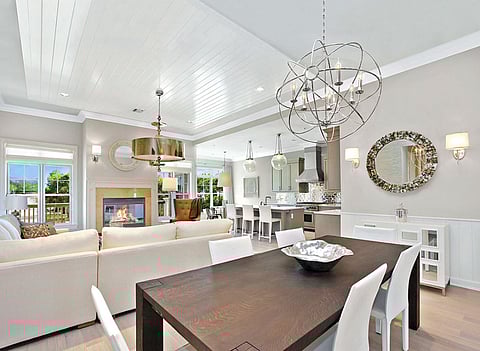 Each Bishops Pond interior is airy, open and dramatic with 9-to-12-foot-high ceilings, oversized windows, 4-inch wide solid hardwood stained oak floors, fireplaces with marble surrounds and open, island kitchens with custom cabinetry, marble or granite countertops and top-of-the-line appliances.