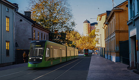 Skiss över den planerade spårvägslinjen i Uppsala. Bilden - Islandsbron vid Fyrisån i centrala Uppsala.