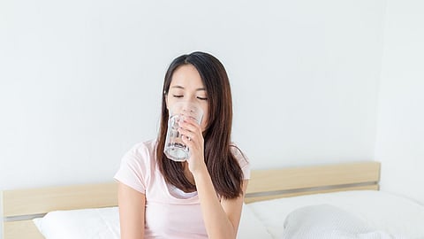 Benefits of water, Why drink water sitting down