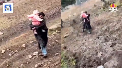kashmiri boy carried a tourists small baby