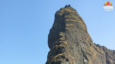 Rescue team carrying injured youth after a 300-feet fall at Chanderi Fort near Badlapur.