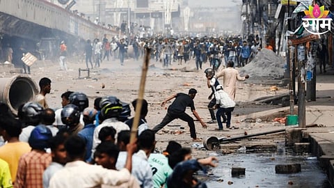 Family members mourn the death of a Hindu youth amid rising communal violence in Bangladesh.