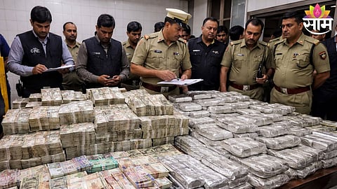 Police officials inspect seized cash, silver bars, and foreign currency during a hawala raid in Kanpur.