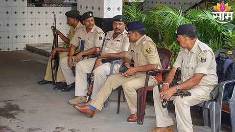 Police personnel investigate the crime scene after two property dealers were shot dead during a land dispute meeting in Rohtas, Bihar.