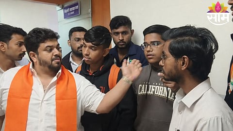 MNS workers confront a teacher at a private coaching class in Nashik following allegations of insulting Marathi students.