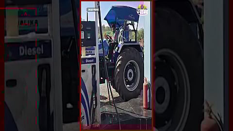 Diesel being filled into a large water tank at a petrol pump in Jalgaon, raising concerns over illegal storage practices.
