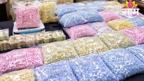 Mumbai ANC officials display seized MDMA pills worth ₹5 crore after arresting a key woman supplier in a major drug bust.