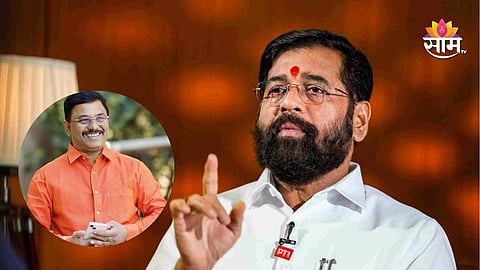 Rajabhau Barge holding Shiv Sena flag with Deputy CM Eknath Shinde and party workers during induction ceremony in Satara district