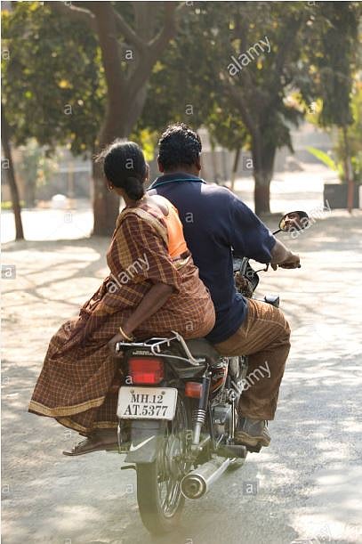गाडीवर  पत्नी बरोबर  असेल तर.......