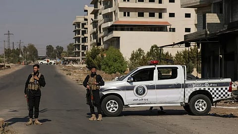 نقطة تفتيش أمنية بقرية المزرعة في محافظة السويداء يوم 21 يوليو 
