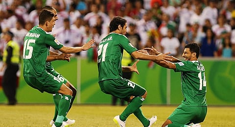 بالصور.. "أسود الرافدين" يُقصون إيران من دور الثمانية