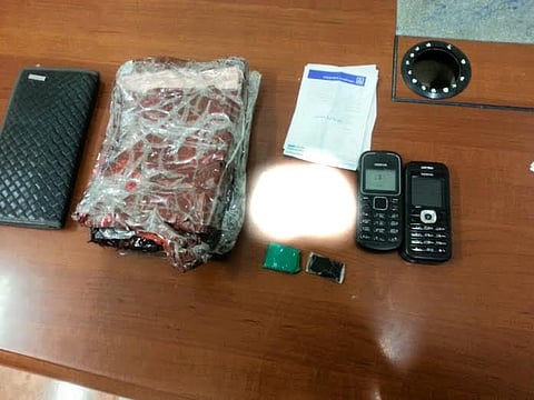 الليث.. ضبط مواطن بحوزته نصف بلاطة حشيش وطلاسم سحرية