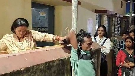 A young man was tied to a pole and beaten for allegedly engaging in obscene acts on a moving local train.