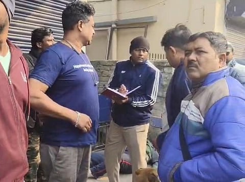 A car dealer died under suspicious circumstances in Barrackpore; his body was found outside his shop.