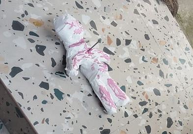 A 'dangerous' doll was found outside the house of a BJP worker.