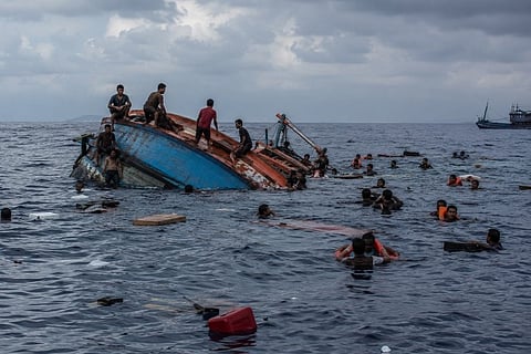 People scrambled onto the boat to save their lives