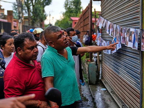 Amidst the devastation in Nepal, a search for loved ones; families are looking for signs of life in the rubble