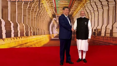 चीन के राष्ट्रपति शी जिनपिंग और प्रधानमंत्री नरेंद्र मोदी 