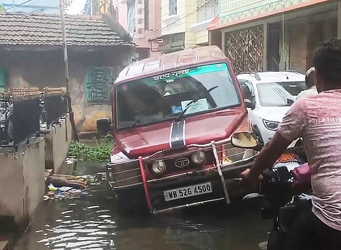 School Poolcar Trapped in Open Drain in Belur Children Safe