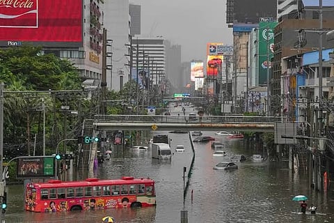 Heavy rain causes flooding and disrupts traffic in Bangkok
