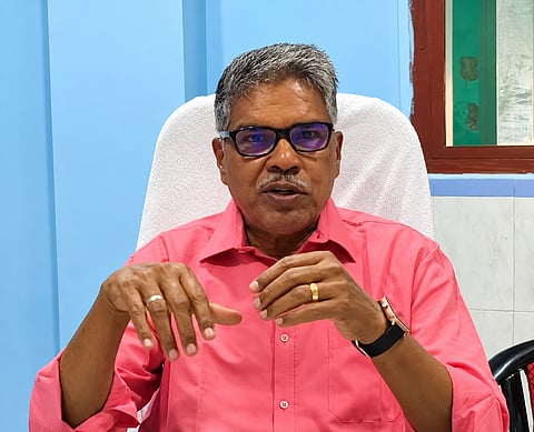 सीटू राज्य समिति के महासचिव बी. चंद्रचूड़न की तस्वीर।