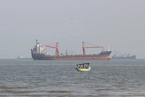 Claims that three ships struck sea mines in the Strait of Hormuz