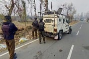Kulgam: Security personnel stand guard during an encounter with militants, in Kulgam, Thursday, Nov. 16, 2023. (PTI Photo) 
(PTI11_16_2023_000303B)
