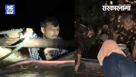 NDRF team and Omraje Nimbalkar rescuing a flood-affected family in Beed district during heavy rain disaster.