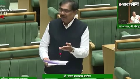 Jayant Patil and minister Sanjay Savkare seen during a heated exchange in the Maharashtra Legislature winter session.