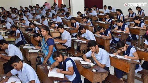 Class 12 students entering examination center as district administration issues important exam instructions.

