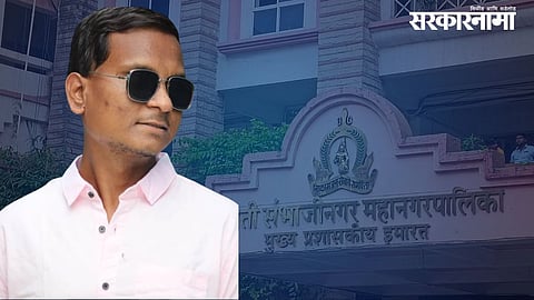 Municipal workers remove an illegal hoarding in Chhatrapati Sambhajinagar during a civic enforcement drive, highlighting rising concerns over electrical safety and unauthorized banners.