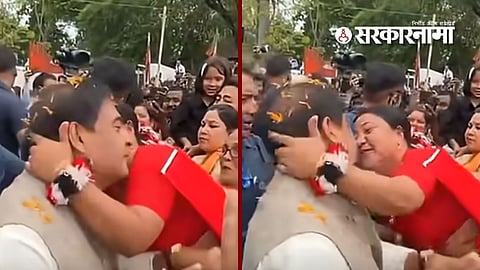 viral video of woman kissing CM during public event