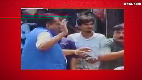 A woman confronts and hits a corporator associated with Eknath Shinde, triggering political reactions and viral attention.

