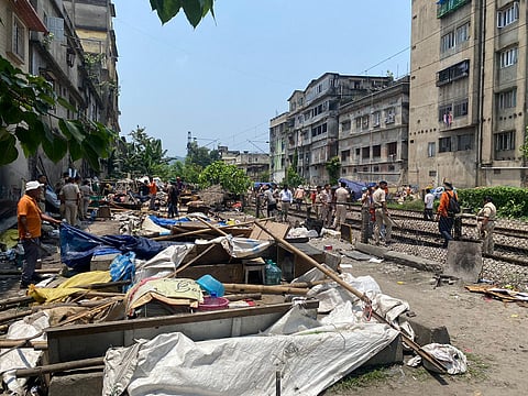Between the stations of Kamakhya and Guwahati, 29 buildings constructed on railroad property are demolished by NFR

