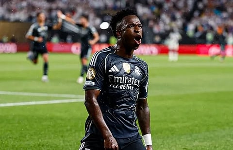 Vinicius shines as Madrid beat Salzburg to clinch top spot in Group H