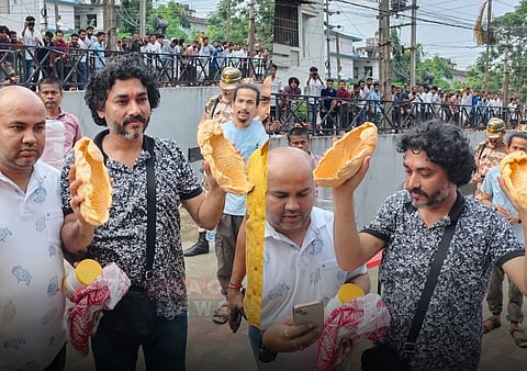 Image of artist Diganta Bharati with the foot imprints