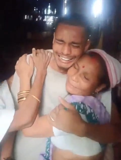 Image of a son and a mother's emotional moment after cracking ADRE examination