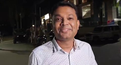 Image of Assam NRI Abhimanyu Talukdar while speaking to the media