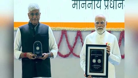 Image of Prime Minister Narendra Modi while launching the commemorative stamp and coin