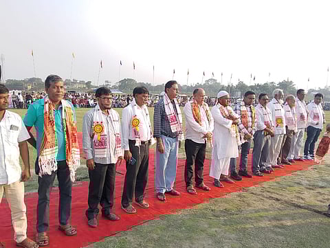 Image shows MLA candidate Nekibur Zaman Monu, along with other members present the programme 