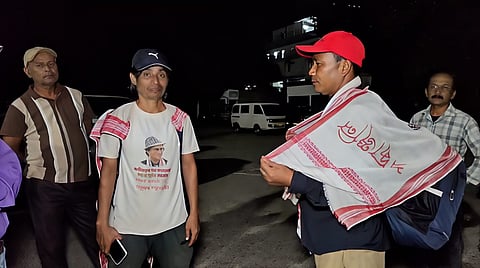 Image of the two men from Lakhimpur have set out on foot to pay tribute to the late singer Zubeen Garg
