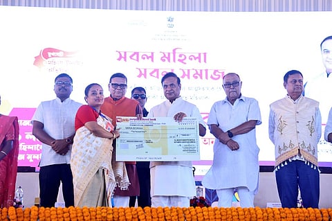 Image of Assam Chief Minister Himanta Biswa Sarma while distributing MMUA seed fund cheques to women entrepreneurs in Gohpur