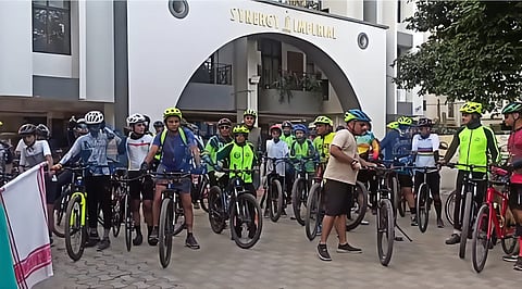 Image showing cyclists gathering in front of Zubeen Garg's residence at Kahilipara for a Memorial Rally to Zubeen Kshetra