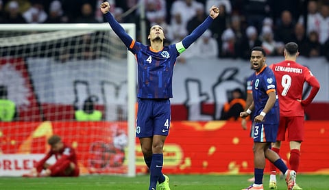 World Cup qualification: Memphis Depay helps Netherlands hold Poland