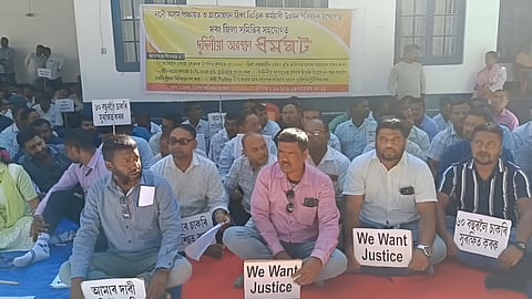 Image shows the Panchayat and Rural Development (P&RD) Contractual Employees staging a Two-Day Sit-In protest in Darrang