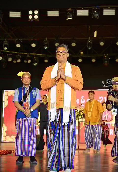 Image of Pijush Hazarika attending the inaugural ceremony of the Poi Pee Mau Tai festival in Namsai