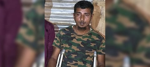 Image of Azgar Ali, the man detained by police