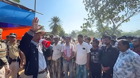 Image of Nagaon DC Devasish Sharma while appealing to the families to vacate Lutumari Reserve Forest
